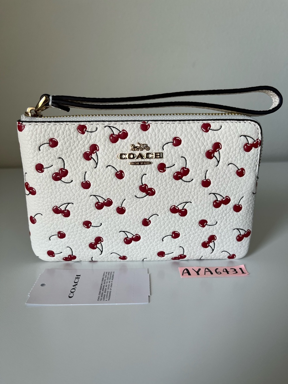 Coach Corner Zip Wristlet With Cherry Print🎈🎈
